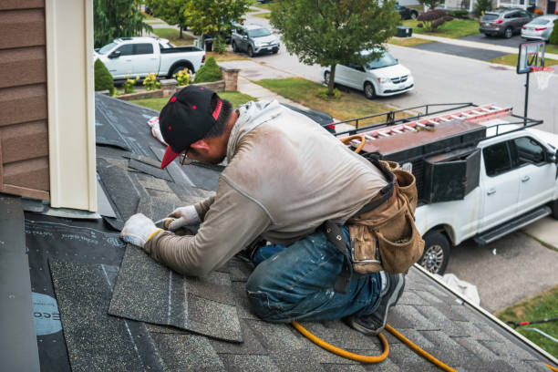 Professional Hail Damage Roof Repair technician working in Las Vegas, NM